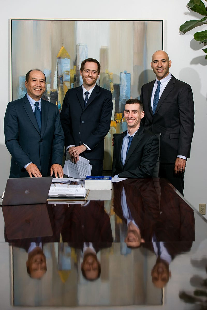 Attorneys Don Nguyen, Aaron Spolin, and Jeremy Cutcher, and legal researcher Dan DeMaria | Spolin & Dukes P.C.
